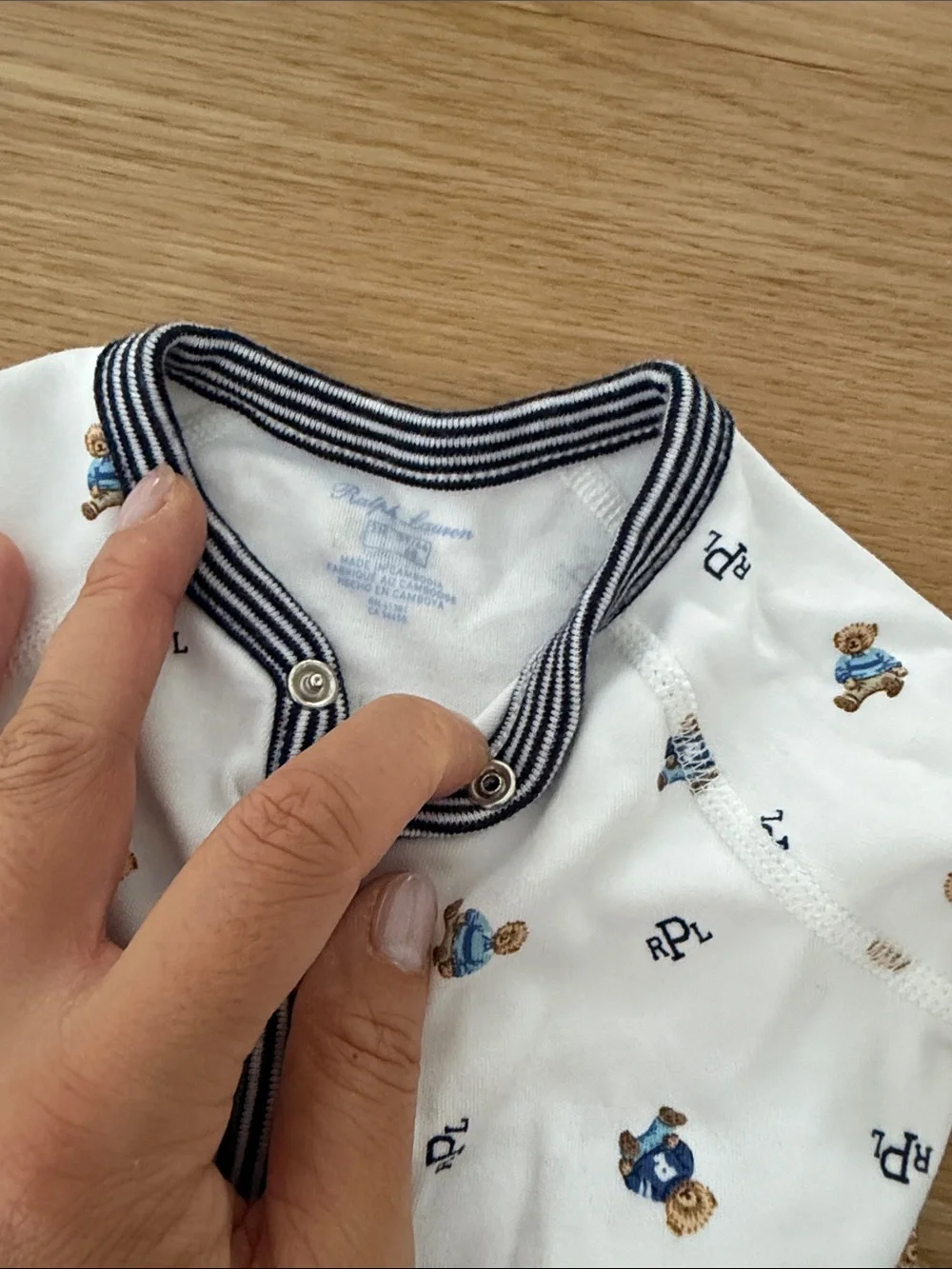 3 Ralph Lauren onesies (1 newborn 2 0-3months)